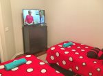 twin room with huge flat screen tv